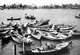 Vietnam: Boats at the pier on the Thu Bon River, Hoi An (1950)