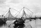 Vietnam: Fishing boats with Chinese-style nets on the Thu Bon River, Hoi An (1950)